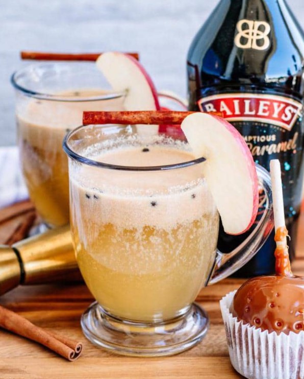 2 glasses with baileys bottle
