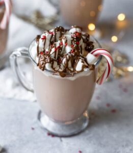 Santa's sleigh alcohol cocktail with whipped cream and chocolate